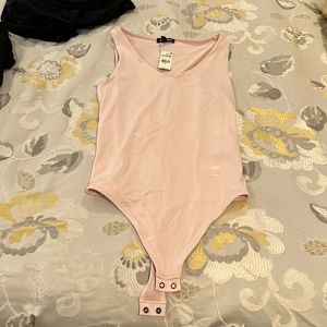 Express light pink thong bodysuit